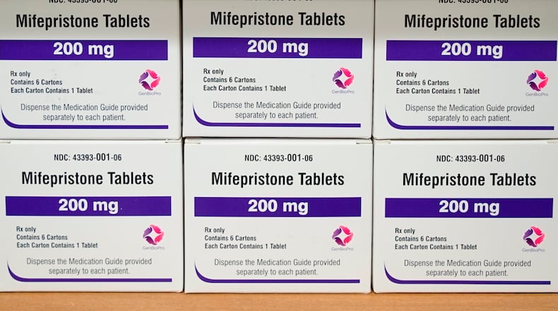 FILE - Boxes of the drug mifepristone sit on a shelf at the West Alabama Women's Center in Tuscaloosa, Ala., March 16, 2022. (AP Photo/Allen G. Breed, File)