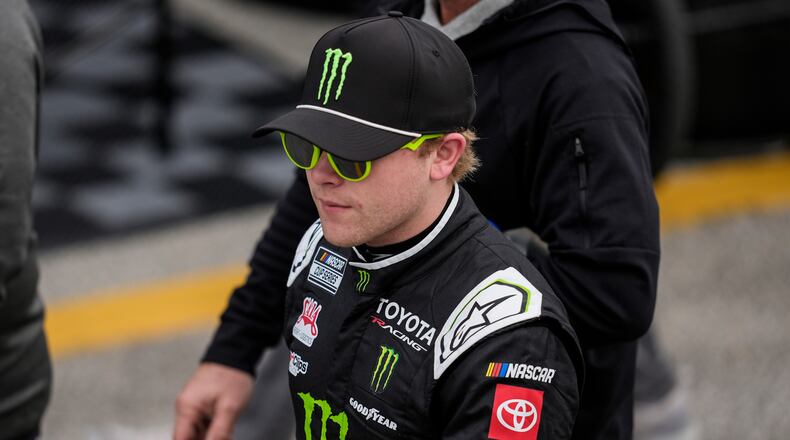 Driver Ty Gibbs walks in the pit area during a NASCAR Daytona 500 practice, Wednesday, Feb. 11, 2026, in Daytona, Fla. (AP Photo/Mike Stewart)