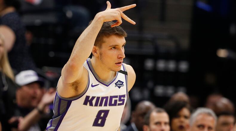 Sacramento Kings guard Bogdan Bogdanovic flashes three fingers after scoring a 3-point basket during the first quarter of the team's game against the Washington Wizards in Sacramento, Calif., Tuesday, March 3, 2020. (Rich Pedroncelli/AP)