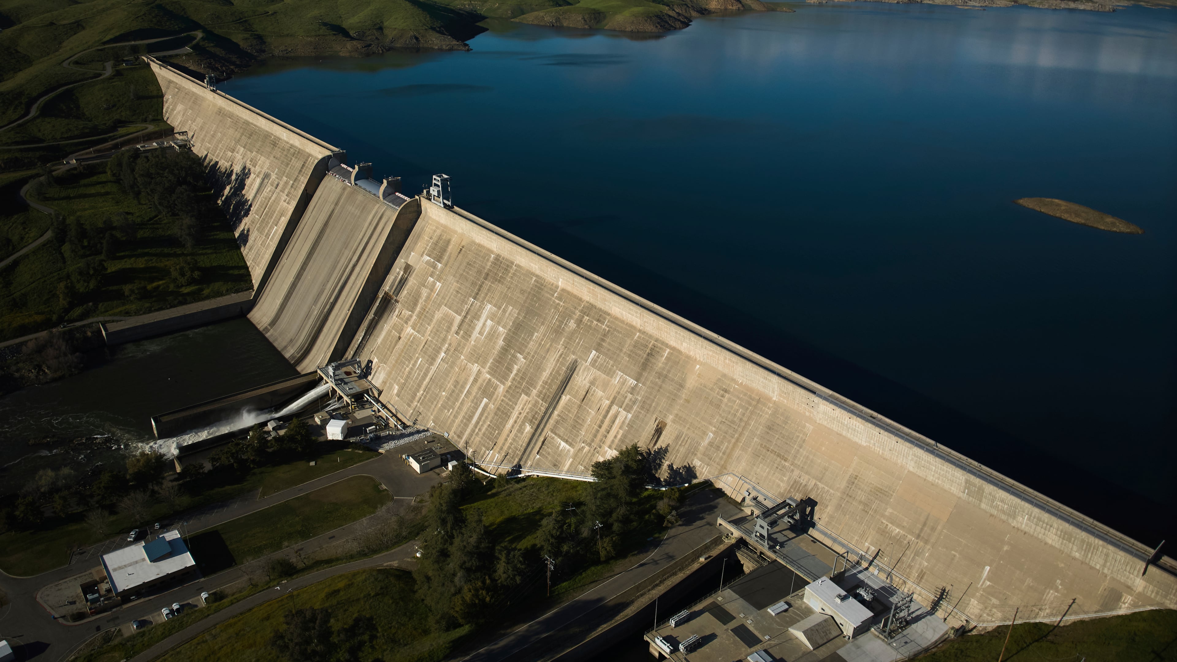 FILE - An aerial view shows Friant Dam which holds back Millerton Lake in Friant, Calif., Friday, March 7, 2025. (AP Photo/Jae C. Hong, File)