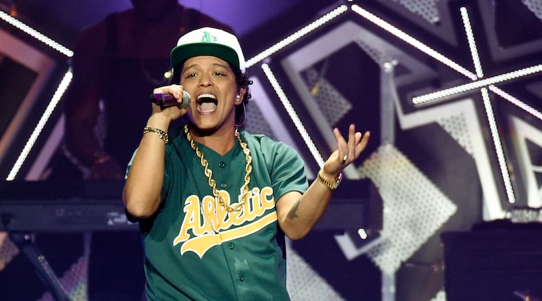 Expert showman Bruno Mars will tear up the Music Midtown stage this fall. (Photo by Chris Pizzello/Invision/AP, File)