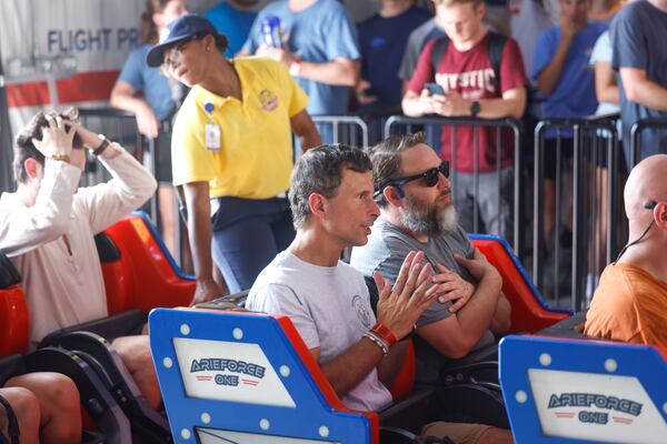 Super-rider James Fordham (center) has ridden ArieForce One more than 28,000 times.   "Feeling the weightlessness ... I love all that. My body likes being in motion,” he says. (Arvin Temkar/AJC)