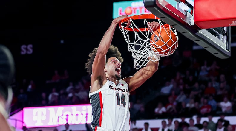 Georgia forward Asa Newell (14) slams home two of his game-high 26 points during the Bulldogs 83-78 win over Tennessee Tech at Stegeman Coliseum in Athens, Ga., on Monday, Nov. 4, 2024. (Conor Dillon/UGA Athletics)