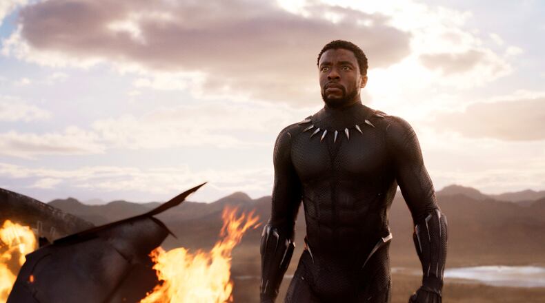 This image released by Disney and Marvel Studios' shows Chadwick Boseman in a scene from "Black Panther," in theaters on Feb. 16, 2018. (Marvel Studios/Disney via AP)