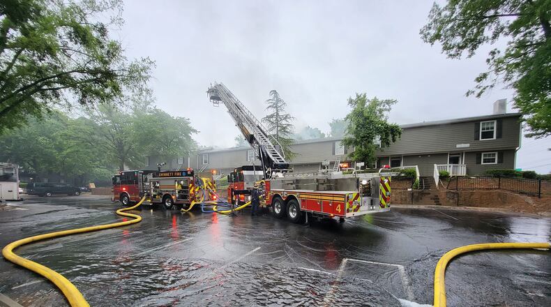 Gwinnett County firefighters battled a blaze at the Fields at Peachtree Corners apartment complex for nearly an hour Wednesday.