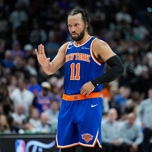 New York Knicks guard Jalen Brunson motions to teammates during the second half of Game 5 of the NBA Finals basketball series against the San Antonio Spurs, Saturday, June 13, 2026, in San Antonio. (AP Photo/Ross D. Franklin)