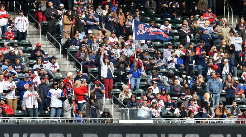 Fans cheer during a Truist Park ceremony celebrating the Braves' World Series win on Nov. 5, 2021. (Hyosub Shin / Hyosub.Shin@ajc.com)