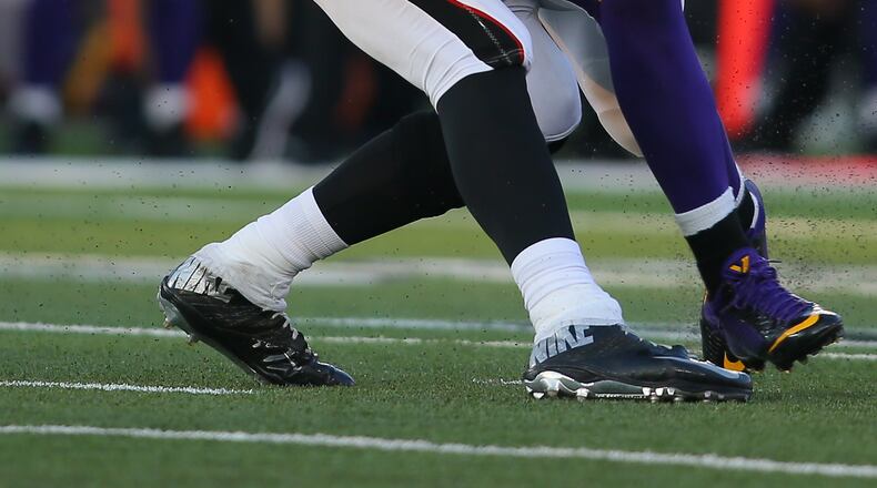 MINNEAPOLIS, MN - SEPTEMBER 28: Matt Ryan #2 of the Atlanta Falcons is sacked by Anthony Barr #55 of the Minnesota Vikings at TCF Bank Stadium on September 28, 2014 in Minneapolis, Minnesota. (Photo by Adam Bettcher/Getty Images) Matt Ryan figures to be under duress even more after losing two (or three) more offensive linemen. (AP photo)