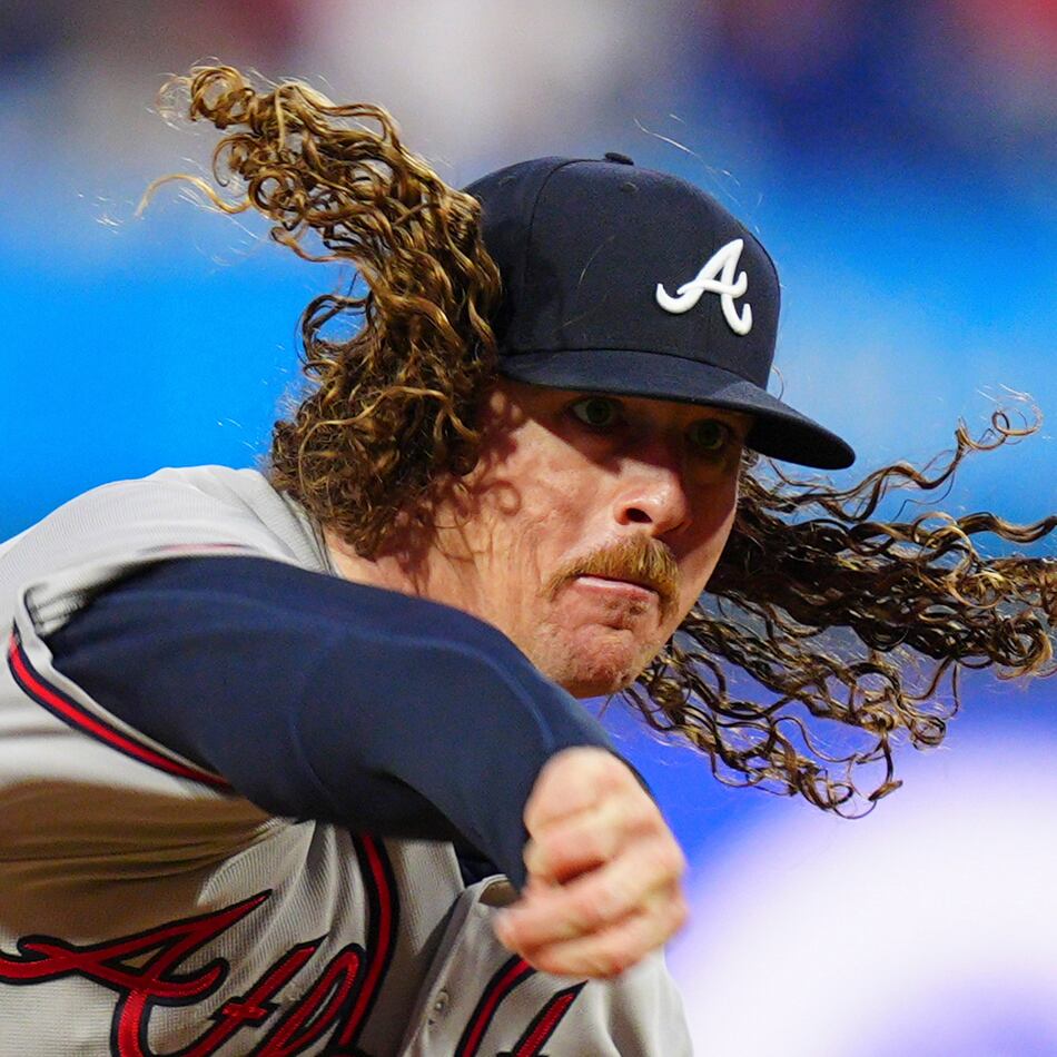 Atlanta Braves pitcher Grant Holmes throws during the first inning of a baseball game against the Philadelphia Phillies, Sunday, April 19, 2026, in Philadelphia. (AP Photo/Derik Hamilton)