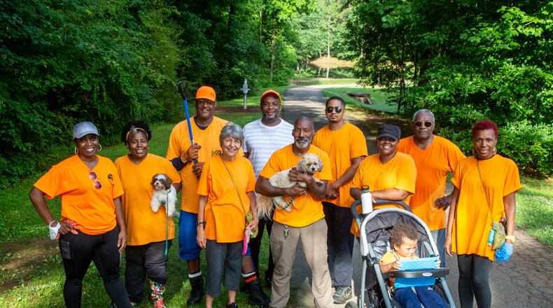 A group of neighbors who call themselves the Central Dekalb Volunteer Cleanup Crew pick up trash at Hairston Park in Stone Mountain. PHIL SKINNER FOR THE ATLANTA JOURNAL-CONSTITUTION.