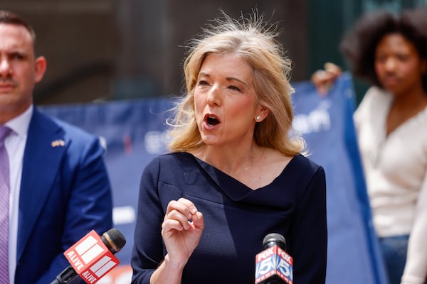 Georgia Supreme Court candidate Jen Jordan speaks at a news conference on voting rights outside of Fulton County Government Center last month. (Arvin Temkar/AJC)
