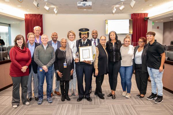 The Dumas Family with the MARTA board of directors at the November board meeting. (Photo Courtesy of MARTA)
