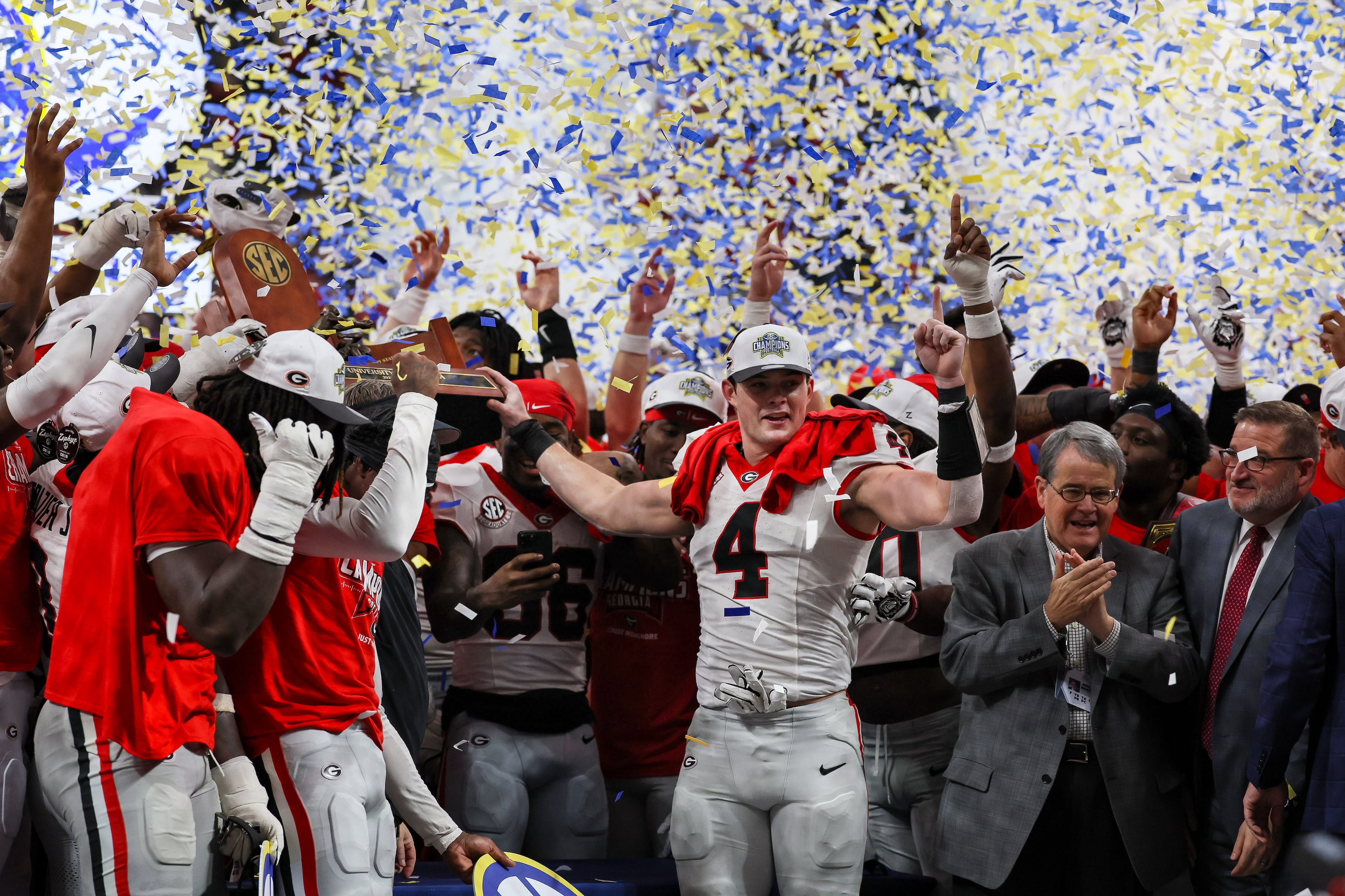 Georgia tight end Oscar Delp (4) celebrates a 28-7 victory over Alabama in the SEC Championship game at Mercedes-Benz Stadium, Saturday, Dec. 6, 2025, in Atlanta. (Jason Getz / AJC)
