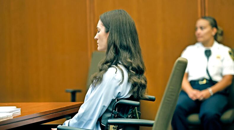 Lindsay Clancy sits as jury selection starts in her murder trial where she is charged in the 2023 killing of her three children, Monday, July 20, 2026, in Plymouth Superior Court in Plymouth, Mass. (Greg Derr/The Patriot Ledger via AP, Pool)