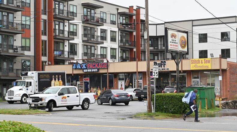 May 12, 2021 Decatur - Puff Smoke Shop is located between the liquor store and clothing alteration store on E. College Ave. in Decatur on Wednesday, May 12, 2021. (Hyosub Shin / Hyosub.Shin@ajc.com)