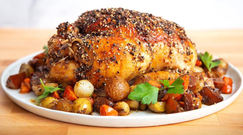 Enjoy a favorite breakfast taste at dinnertime with Everything Bagel-crusted Roast Chicken with Root Vegetables. (Courtesy of Brooke Slezak)