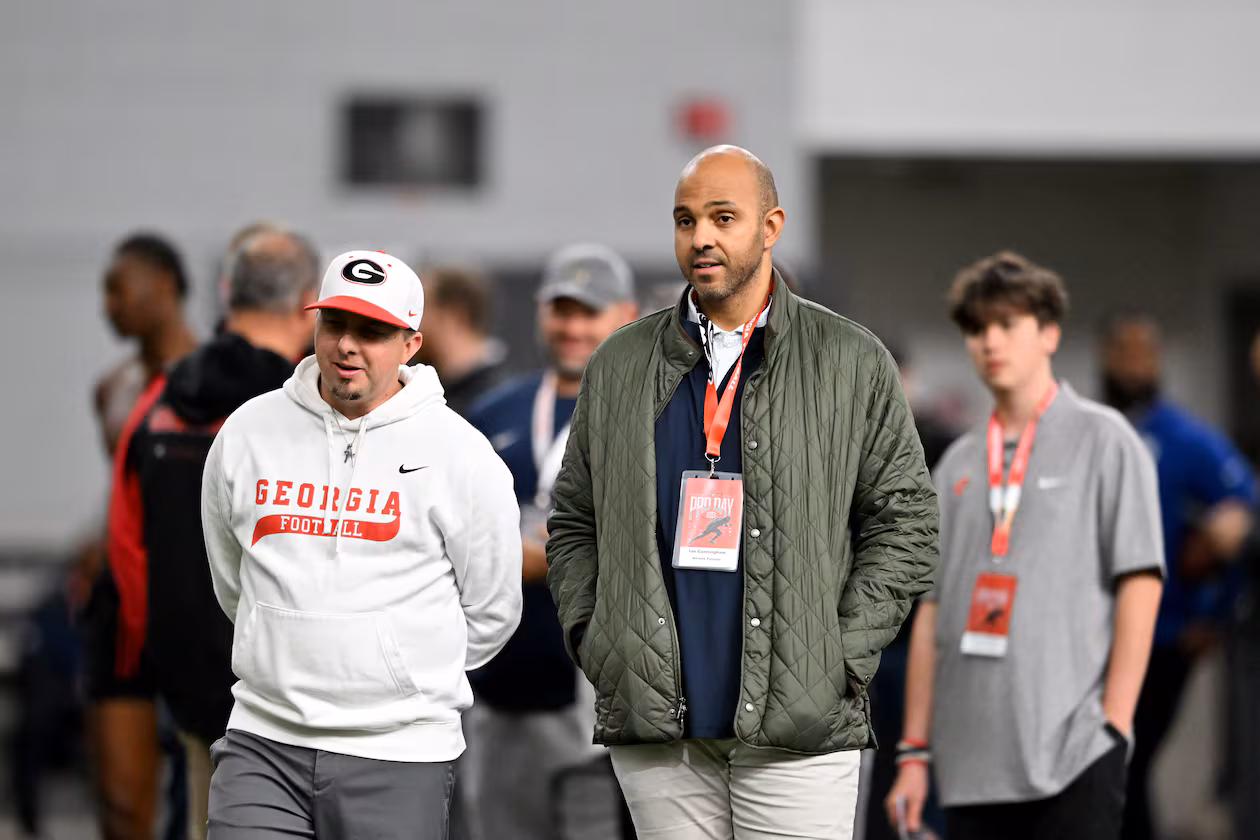Falcons general manager Ian Cunningham (right) — pictured at Georgia's NFL pro day in Athens in March — has just five picks to work with in the NFL draft, with Atlanta's earliest pick the 48th overall. (Hyosub Shin/AJC)