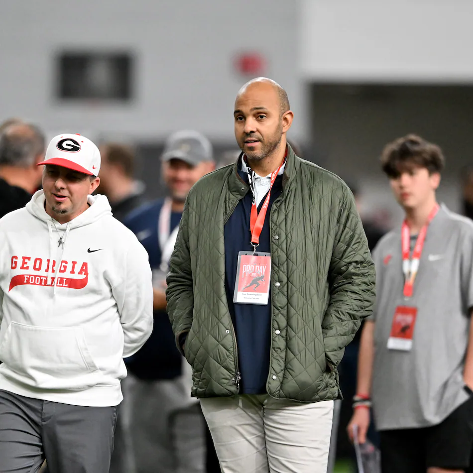 Falcons general manager Ian Cunningham (right) — pictured at Georgia's NFL pro day in Athens in March — has just five picks to work with in the NFL draft, with Atlanta's earliest pick the 48th overall. (Hyosub Shin/AJC)