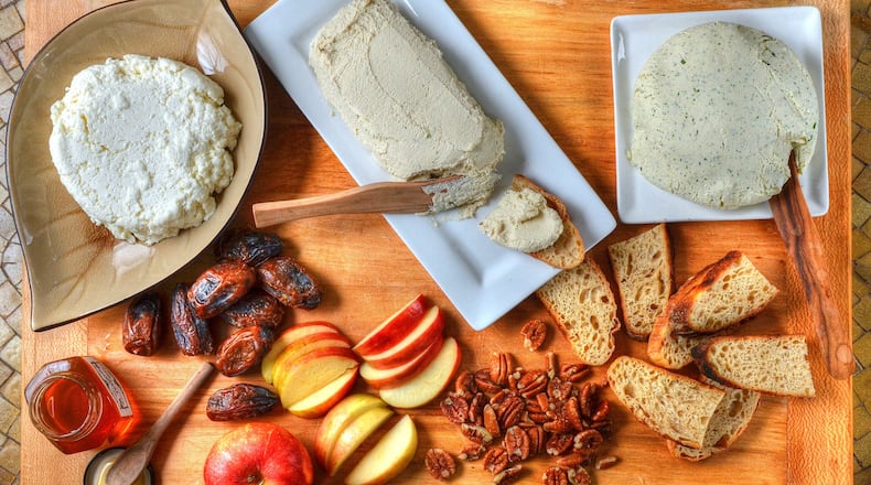Left to right: Paneer, Tofu Chevre, Boursin - style herb and garlic “cheese.” STYLING BY CONNE WARD-CAMERON CHRIS HUNT/SPECIAL