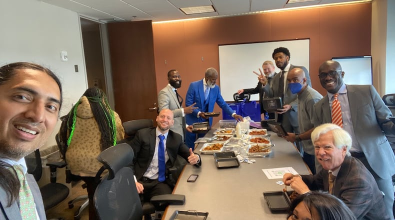 Attorney Suri Chadha Jimenez, left, bought wings for attorneys in the YSL case after being held in contempt for being late to court on Tuesday.