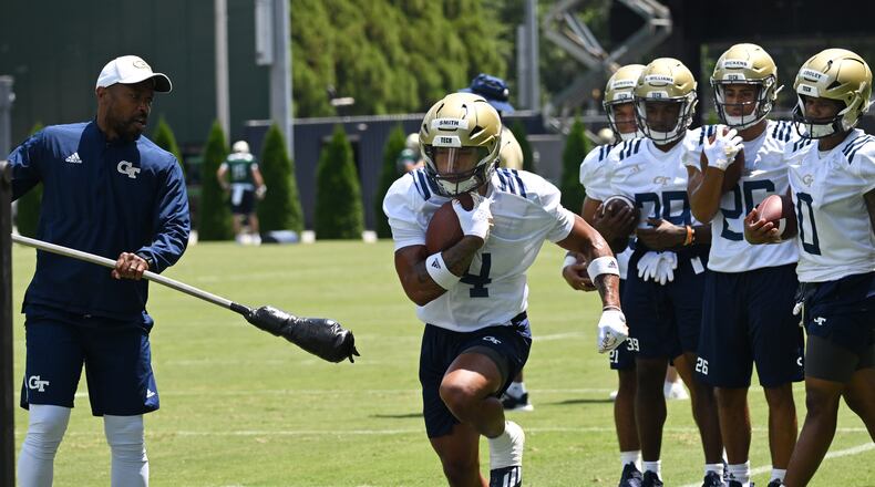 Georgia Tech running back Dontae Smith (4) runs a drill during a practice at Georgia Tech’s Rose Bowl Field, Tuesday, August 1, 2023, in Atlanta. (Hyosub Shin / Hyosub.Shin@ajc.com)