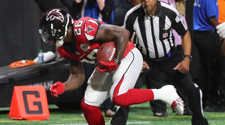September 17, 2017 Atlanta: Falconsrunning back Tevin Coleman scores a touchdown for a 24-7 lead over the Packers during the second quarter in a NFL football game on Sunday, September 17, 2017, in Atlanta.    Curtis Compton/ccompton@ajc.com