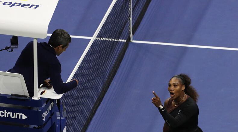 Serena Williams argues with umpire Carlos Ramos during her Women's Singles finals match against Naomi Osaka during the 2018 US Open Women's final Sept. 8, 2018, in New York.