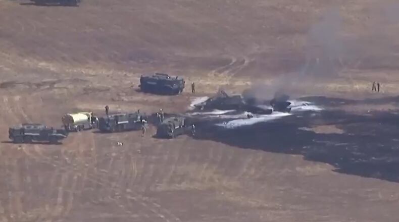 This image made from a video provided by KGTV shows the scene of an F-35 jet crash Friday, July 31, 2026, near the Miramar Air Base in San Diego. (KGTV via AP)