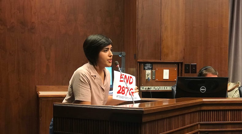 A handful of people spoke out against 287(g) at a Cobb County Commission Meeting in late May. (Meris Lutz/AJC)