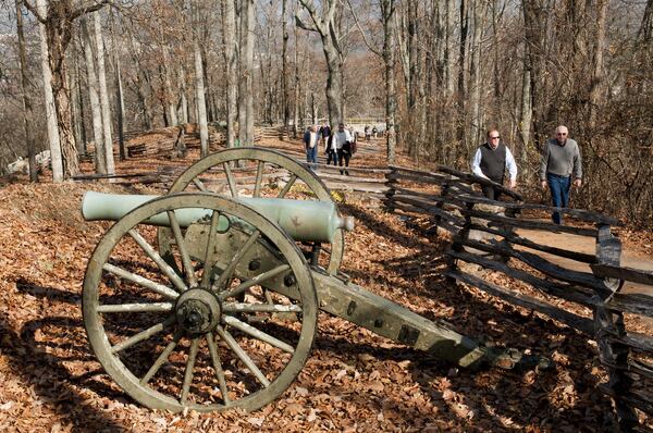Edmond Bush, left, hikes with his out of town guest, Bob Crowder, of Emory, Virginia, up Kennesaw Mountain National Battlefield Park Saturday, December 1, 2012 in Kennesaw. The Kennesaw Mountain National Battlefield Park stands as more than a scenic memorial to one of the Civil War’s battles. It’s also the most-visited battlefield site in the nation, surpassing Gettysburg last year. Visitors to the trails and greenspace offer a surprising window to Cobb County’s economic future.