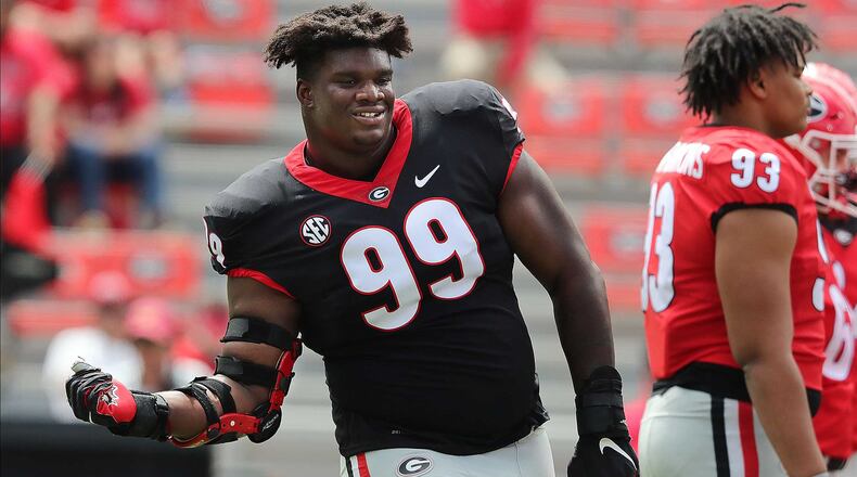 041721 Athens: Georgia defensive lineman Jordan Davis gets his groove on during the G-Day game at Sanford Stadium on Saturday, April 17, 2021, in Athens. “Curtis Compton / Curtis.Compton@ajc.com”
