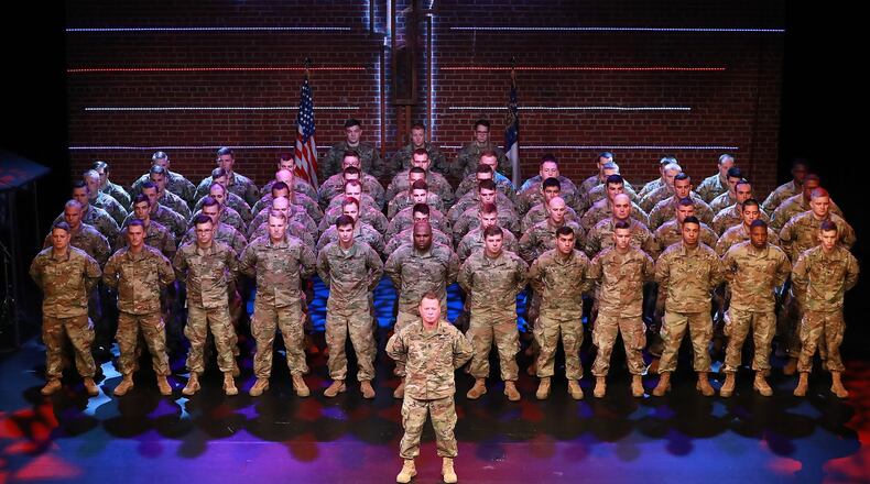Georgia National Guard troops with the 108th Calvary Regiment form ranks on the stage of Rock Bridge Community Church during a send-off ceremony deploying to Afghanistan on Monday, Nov. 26, 2018, in Dalton. Many other such send-off events will play out across the state in the coming weeks as about 2,200 troops from Georgia’s 48th Brigade head to Fort Stewart for final training and then to a restive part of Afghanistan to join the longest war in America’s history, a fight that is now in its 17th year. Curtis Compton/ccompton@ajc.com