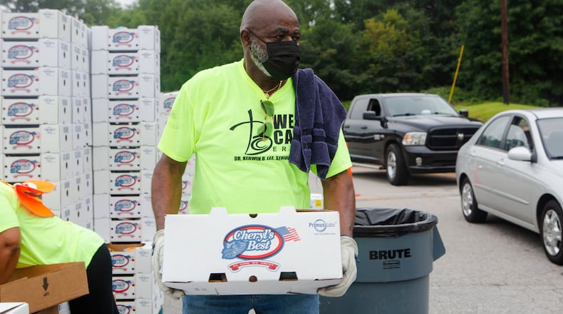 Robert Lindsey volunteers during a food giveaway event at Berean Christian Church on Saturday, August 27, 2022, in Stone Mountain. The free food was paid for using federal COVID-19 relief funds, and was distributed at churches throughout Dekalb County. CHRISTINA MATACOTTA FOR THE ATLANTA JOURNAL-CONSTITUTION.