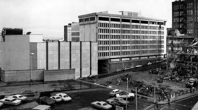 This photo from 1973 shows the papers’ new Marietta Street home in the background and the demolition of 10 Forsyth in the foreground. In the lower left of the photo, cars are still parked in front of the spot where Union Station once stood, even though that building had already been demolished by then. (Bill Mahan/AJC file)