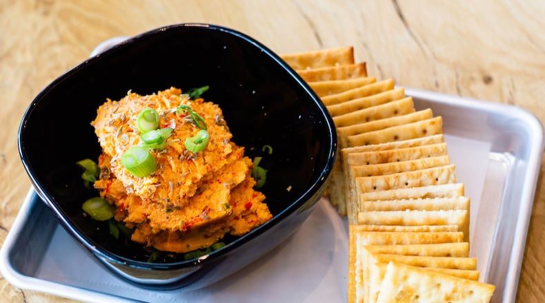 SweetWater Taproom's pimento cheese, made with Duke's mayo, peppadews, green onions, toasted spent grain and dipped saltines.