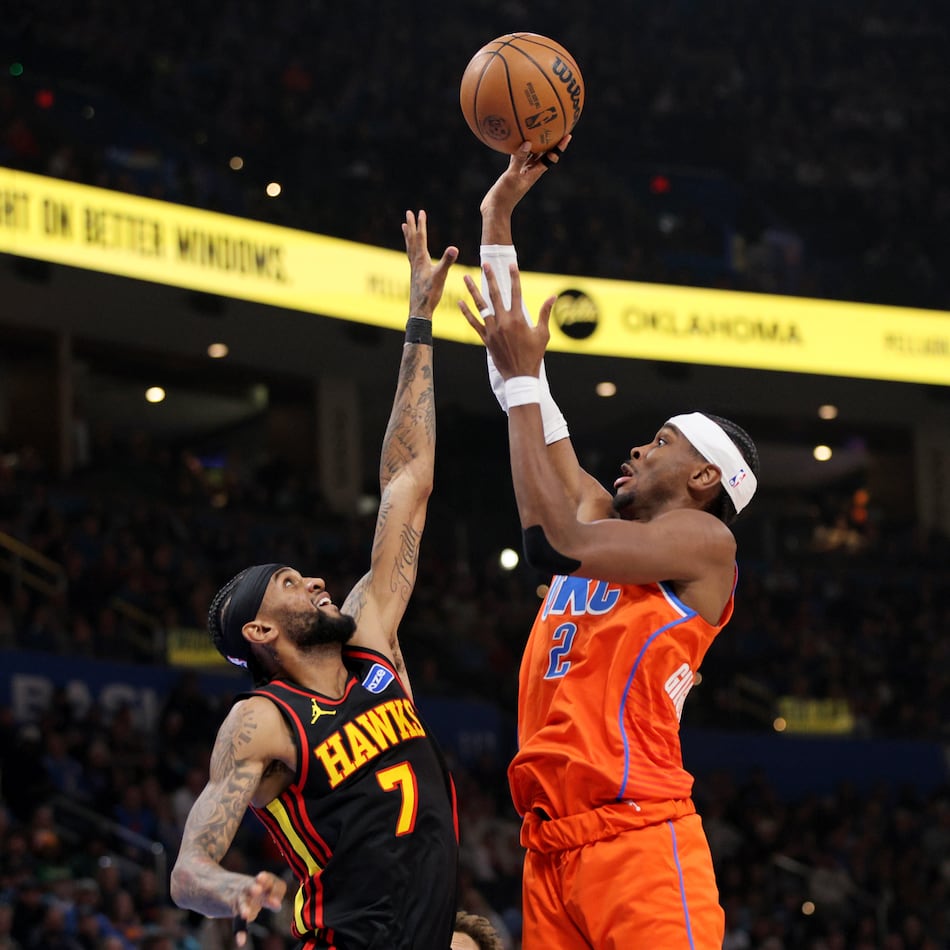 Oklahoma City Thunder guard Shai Gilgeous-Alexander (2) shoots over Atlanta Hawks guard Nickeil Alexander-Walker (7) during the second half of an NBA basketball game Monday, Dec. 29, 2025, in Oklahoma City. (Nate Billings/AP)