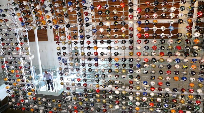 The wall of helmets at the College Football Hall of Fame.