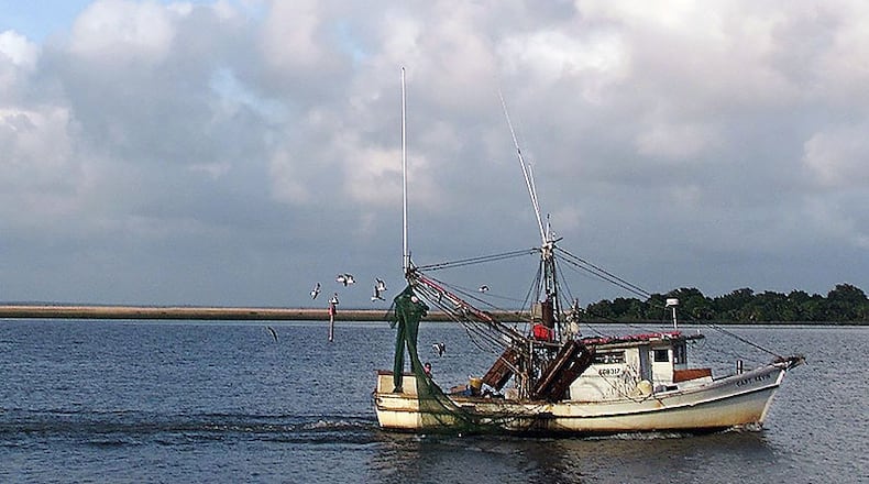 A shrimp boat on the Apalachicola River at sunset.