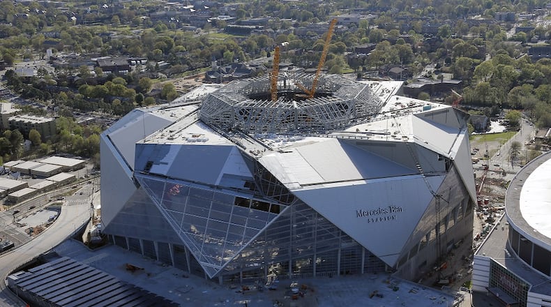 March 31,  2017 - Atlanta - Mercedes Benz Stadium, future home of the Atlanta Falcons, sits next to the Georgia Dome.  Aerial photos shot March 31, 2017.   BOB ANDRES  /BANDRES@AJC.COM