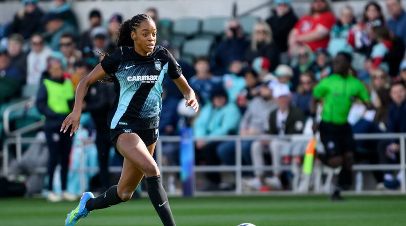 FILE- Gotham FC forward Jordynn Dudley brings the ball upfield against the Kansas City Current during an NWSL soccer match, April 4, 2026, in Kansas City, Mo. (AP Photo/Reed Hoffmann, File)