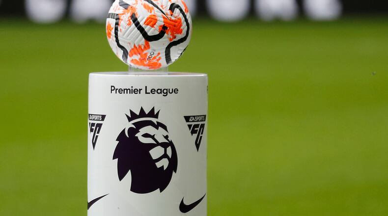 FILE - The match ball is set on a pedestal with the logo of the English Premier League before the soccer match between Newcastle and Aston Villa, in Newcastle, England, on Aug. 12, 2023. (AP Photo/Steve Luciano, File)