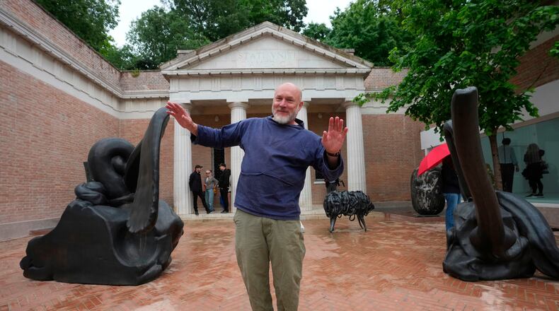 Artist Alma Allen poses outside the United States pavilion 'Call Me the Breeze' at the Venice 2026 Biennale Art, in Venice, Italy, Tuesday, May 5, 2026. (AP Photo/Luca Bruno)