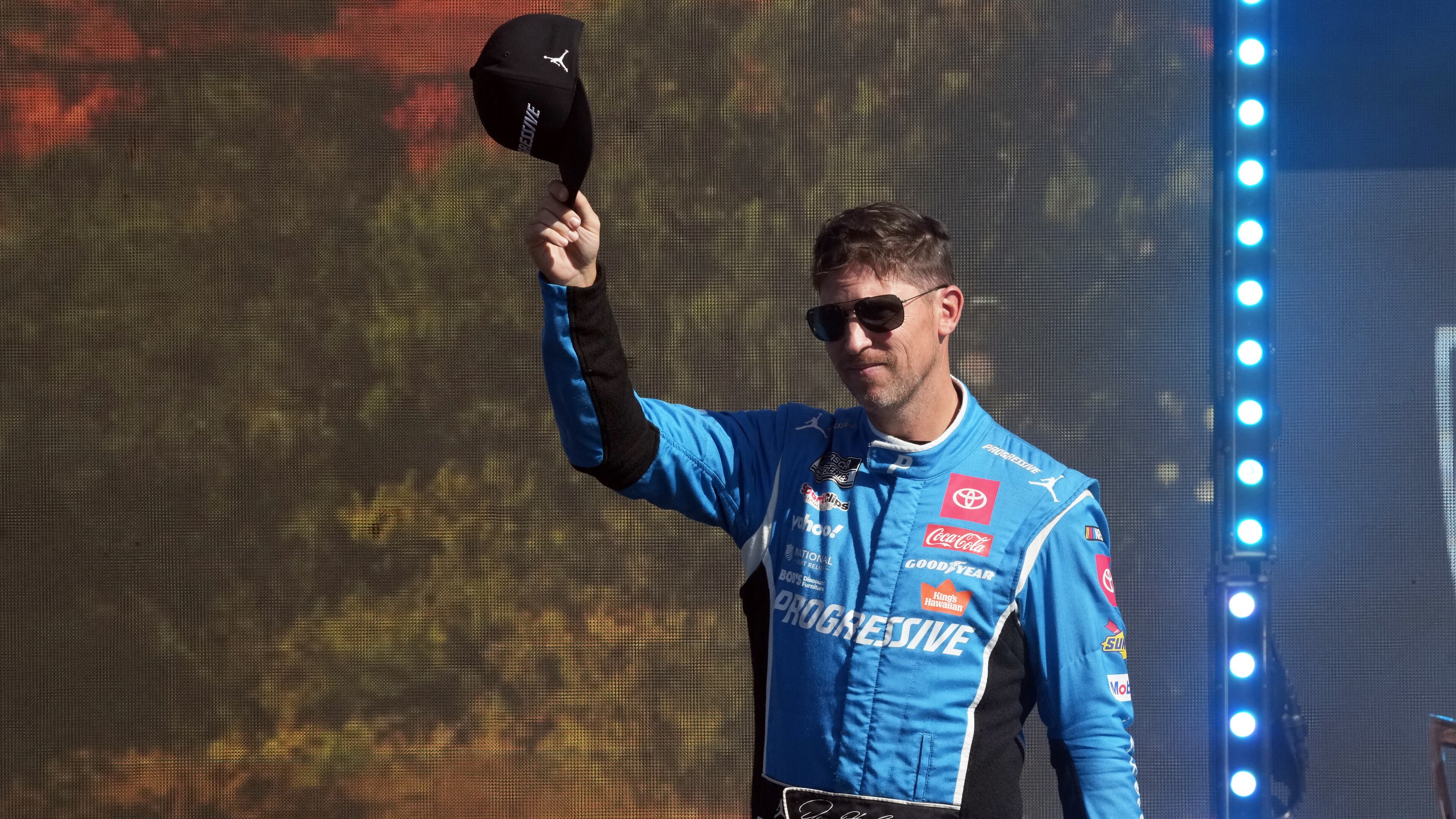 FILE - Denny Hamlin is introduced before a NASCAR Cup Series auto race Sunday, Nov. 2, 2025, in Avondale, Ariz. (AP Photo/Rick Scuteri, File)