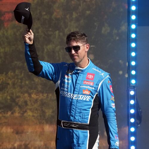 FILE - Denny Hamlin is introduced before a NASCAR Cup Series auto race Sunday, Nov. 2, 2025, in Avondale, Ariz. (AP Photo/Rick Scuteri, File)