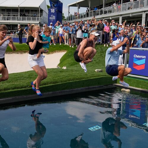 Nelly Korda celebrates by jumping in the water after winning the Chevron Championship LPGA golf tournament Sunday, April 26, 2026, in Houston. (AP Photo/Ashley Landis)