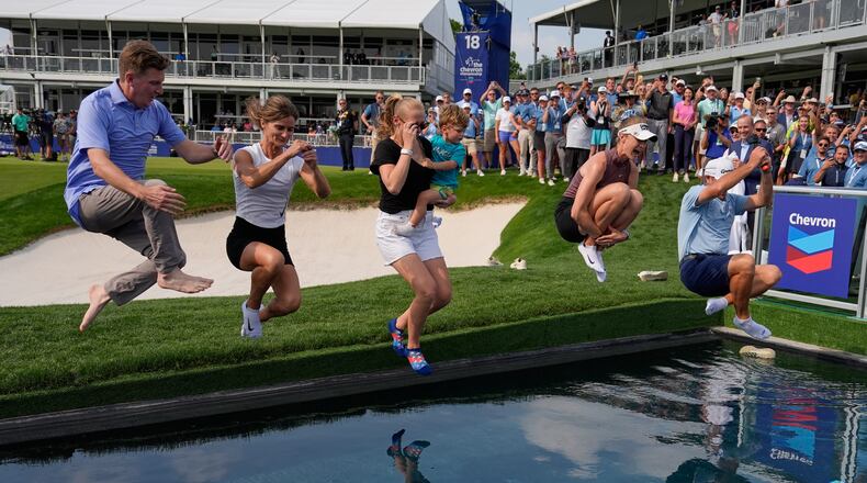 Nelly Korda celebrates by jumping in the water after winning the Chevron Championship LPGA golf tournament Sunday, April 26, 2026, in Houston. (AP Photo/Ashley Landis)