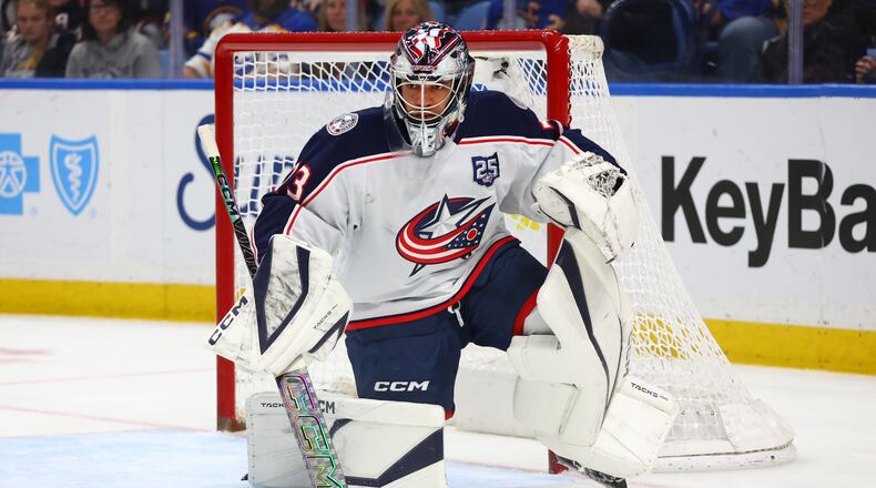 FILE - Columbus Blue Jackets goaltender Jet Greaves (73) makes a save during the first period of an NHL hockey game against the Buffalo Sabres, April 9, 2026, in Buffalo, N.Y. (AP Photo/Jeffrey T. Barnes, File)