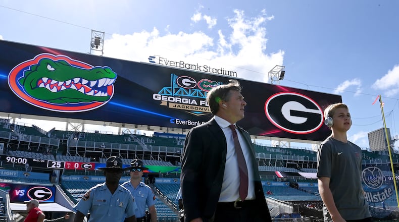 Georgia head coach Kirby Smart walks on the football field as he arrives for the NCAA football game between Georgia and Florida at EverBank Stadium in Jacksonville, Fla. (Hyosub Shin/AJC 2024)