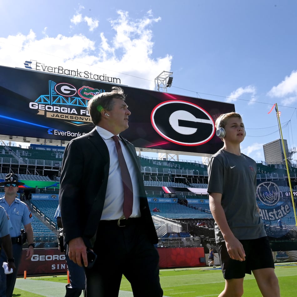 Georgia head coach Kirby Smart walks on the football field as he arrives for the NCAA football game between Georgia and Florida at EverBank Stadium in Jacksonville, Fla. (Hyosub Shin/AJC 2024)