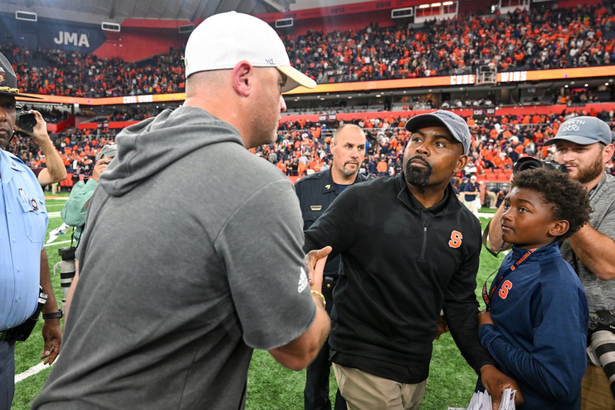 Georgia Tech head coach Brent Key (left) congratulates Syracuse head coach Fran Brown after after the Orange beat the Yellow Jackets on Sept. 7, 2024. (Hans Pennink/AP)